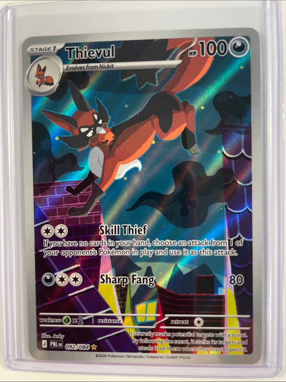 Pokemon Thievul Holo Card - Red & Black with Blue-Green Holo